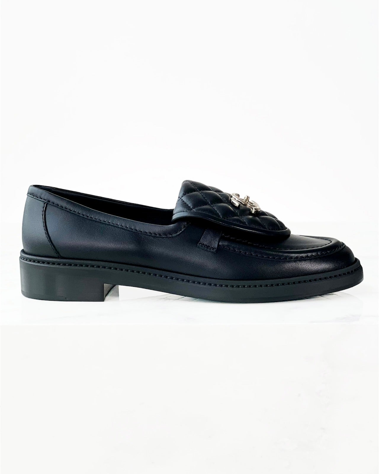 Black Quilted Tab Lambskin Flap Loafers