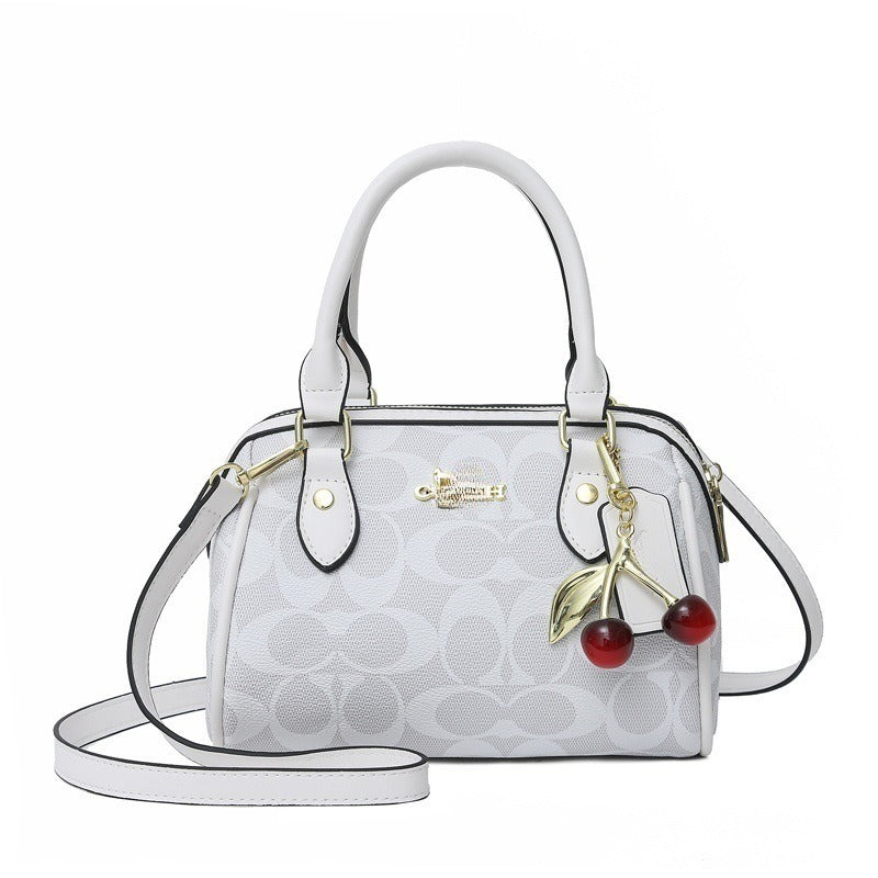 Mini Rowan Crossbody Bag In Signature Canvas