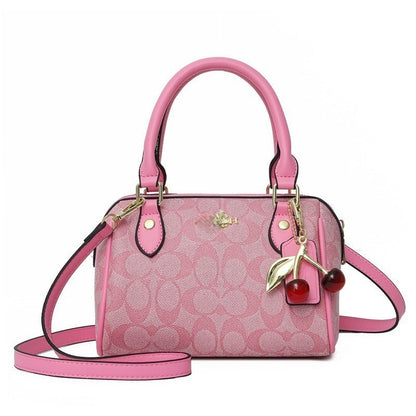 Mini Rowan Crossbody Bag In Signature Canvas